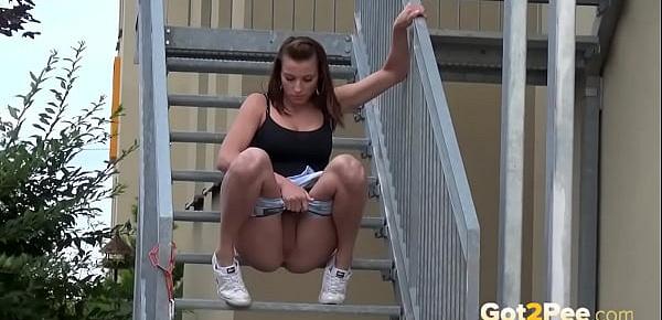  Fit Brunette Pees Down The Stairs
